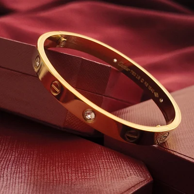 Brazalete de Tornillos con Piedras Tono Oro Amarillo