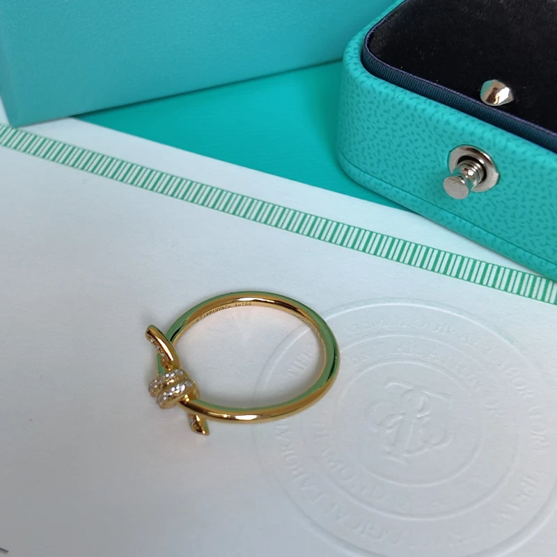 Anillo Nudo con Piedras en Plata 925 con Laminado en Oro 18k